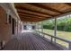 View of the covered patio, backyard and storage shed, accessible from the house at 6176 Ammons St, Arvada, CO 80004