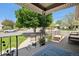 Charming front porch with decorative iron railings and a welcoming seating area, perfect for enjoying the neighborhood views at 4780 E Montana Pl, Denver, CO 80222