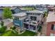 Stunning aerial view of the backyard with deck and patio seating perfect for entertaining at 817 Backcountry Ln, Highlands Ranch, CO 80126