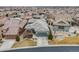 Stunning aerial view of a modern home with a well-manicured lawn and lush landscaping in a beautiful neighborhood at 817 Backcountry Ln, Highlands Ranch, CO 80126
