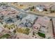 Expansive aerial view showcasing the property, its backyard, patio, and surrounding neighborhood at 817 Backcountry Ln, Highlands Ranch, CO 80126