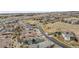 Expansive community aerial showcasing the neighborhood's layout, amenities, and proximity to open spaces at 817 Backcountry Ln, Highlands Ranch, CO 80126
