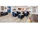 Open basement with a cozy seating area, stylish decor, and a pool table for entertainment at 817 Backcountry Ln, Highlands Ranch, CO 80126