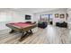 Entertainment basement with a pool table, comfortable seating area, and stylish decor at 817 Backcountry Ln, Highlands Ranch, CO 80126