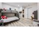 ' bedroom features a sturdy bunk bed with staircase and a cozy seating area at 817 Backcountry Ln, Highlands Ranch, CO 80126