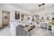 Bright living room with dining room, kitchen and view, capturing the essence of modern comfort at 817 Backcountry Ln, Highlands Ranch, CO 80126