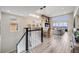 Open-concept living and dining area with a view of the fireplace and outdoor scenery at 817 Backcountry Ln, Highlands Ranch, CO 80126