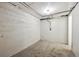 Unfinished basement space with carpeted floor, ready for customization or extra storage at 4001 S Acoma St, Englewood, CO 80110