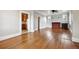 Spacious living room featuring hardwood floors, a fireplace and ample natural light at 4001 S Acoma St, Englewood, CO 80110
