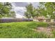 Expansive backyard featuring lush greenery and a secure fence, ideal for outdoor activities and privacy at 1737 Beeler St, Aurora, CO 80010