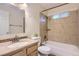 Bathroom featuring a shower and bathtub, vanity sink, and a tiled shower at 1737 Beeler St, Aurora, CO 80010