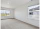 Spacious room with great natural light and neutral carpet, perfect for a bedroom or office at 4113 Marble Dr, Mead, CO 80504