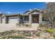 Charming home with stone accents, well-maintained landscaping, and a welcoming front porch at 4781 Mariposa Rd, Castle Rock, CO 80104