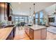 Spacious kitchen with a center island, stainless steel appliances, and scenic views at 4781 Mariposa Rd, Castle Rock, CO 80104