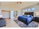 Comfortable bedroom with ensuite bathroom and walk-in closet, offering a serene retreat at 4781 Mariposa Rd, Castle Rock, CO 80104
