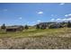 Picturesque property featuring a barn, lush green fields, and a beautiful home at 4781 Mariposa Rd, Castle Rock, CO 80104