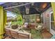 Charming covered patio with comfortable seating, perfect for enjoying outdoor living and relaxation at 5323 E Sandpiper Ave, Castle Rock, CO 80104