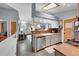 Bright, functional kitchen with stainless appliances, connecting seamlessly to living spaces at 5323 E Sandpiper Ave, Castle Rock, CO 80104