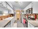 Functional kitchen showcasing stainless steel appliances, ample counter space, and a traditional design at 5323 E Sandpiper Ave, Castle Rock, CO 80104