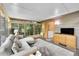 Inviting sunroom with plenty of light, comfortable furniture, and relaxing space at 5323 E Sandpiper Ave, Castle Rock, CO 80104