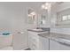 Bathroom boasts an extended vanity with mirrors and a shower with white tiling at 778 2Nd St, Firestone, CO 80520