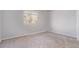 Neutral bedroom with carpet, window, and light gray walls, creating a peaceful atmosphere at 778 2Nd St, Firestone, CO 80520