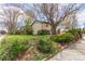 Well-maintained home featuring mature landscaping, a spacious lawn, and a charming facade at 778 2Nd St, Firestone, CO 80520