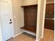 Entryway with built-in bench and coat hooks at 39110 E 146Th Ct, Keenesburg, CO 80643