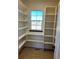 Walk-in pantry with ample shelving for storage at 39110 E 146Th Ct, Keenesburg, CO 80643