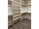 Large walk-in closet with ample shelving and hanging space at 39110 E 146Th Ct, Keenesburg, CO 80643