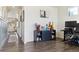 Home office featuring hardwood floors, a modern desk setup, and stylish decor at 9 N Waterloo St, Aurora, CO 80018