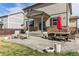 Cozy patio featuring outdoor seating and a dining area for enjoying the backyard views at 9 N Waterloo St, Aurora, CO 80018