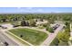 Aerial view showcasing community park with playground, parking and green spaces at 805 S Everett St, Lakewood, CO 80226