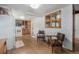 Cozy kitchen featuring white brick walls, and classic wood cabinets at 805 S Everett St, Lakewood, CO 80226