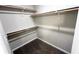 This is a spacious closet with shelving for ample storage at 2277 Serenidad St, Brighton, CO 80601