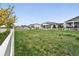 Large lot with a white fence surrounding the property in a quiet neighborhood at 5670 Pinto Valley St, Parker, CO 80134