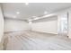 Unfinished basement with neutral walls and carpeting ready for customization and offers great potential at 5670 Pinto Valley St, Parker, CO 80134