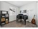 Charming bedroom features a piano and a guitar, perfect for music lovers at 5670 Pinto Valley St, Parker, CO 80134