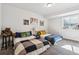 Neutral toned bedroom with two beds, and carpeted floors at 5670 Pinto Valley St, Parker, CO 80134