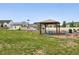 Community park features a picnic shelter, picnic table, trash can, boulders and green space for residents to enjoy at 5670 Pinto Valley St, Parker, CO 80134