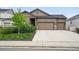 Charming single-Gathering home with a three-car garage and well-maintained front yard at 5670 Pinto Valley St, Parker, CO 80134