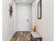 Inviting hallway with stylish flooring, decor, and natural light creates a warm and welcoming atmosphere at 5670 Pinto Valley St, Parker, CO 80134