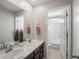 Bathroom with double vanity and marble countertop at 3260 Jonquil St, Castle Rock, CO 80109