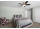 Bedroom with carpeted floor, window, and ceiling fan at 3260 Jonquil St, Castle Rock, CO 80109