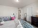 Spacious bedroom with a double bed and access to laundry room at 3260 Jonquil St, Castle Rock, CO 80109