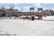 Community park with playground, pavilion, and benches in winter at 3260 Jonquil St, Castle Rock, CO 80109