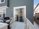 Back deck with sliding glass door and grill at 3260 Jonquil St, Castle Rock, CO 80109