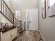 Bright entryway with hardwood floors and a staircase at 3260 Jonquil St, Castle Rock, CO 80109