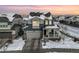 Two-story house with gray siding, white trim, and a covered porch at 3260 Jonquil St, Castle Rock, CO 80109