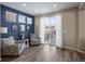 Cozy sitting area with two armchairs and access to a deck at 3260 Jonquil St, Castle Rock, CO 80109